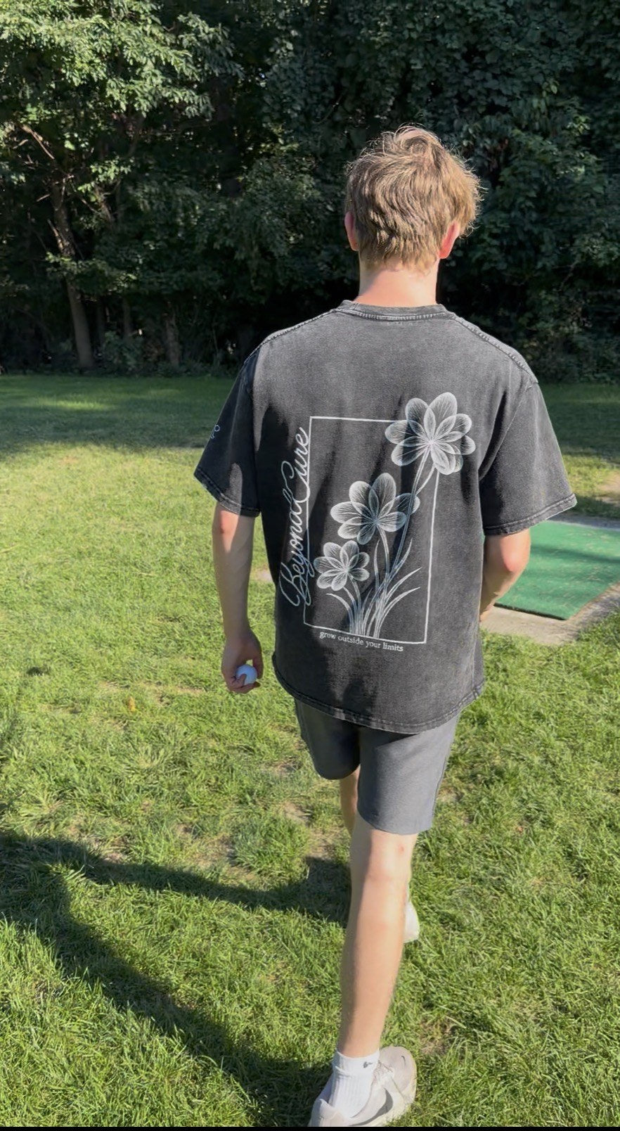 BeyondCure golf campaign close back graphic walking on the course