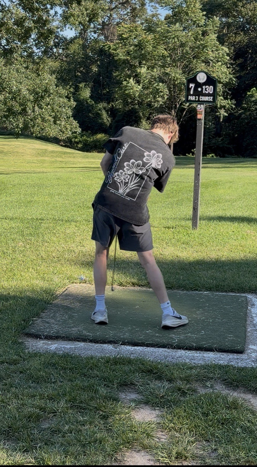 BeyondCure golf campaign showing the back graphic during a golf setup