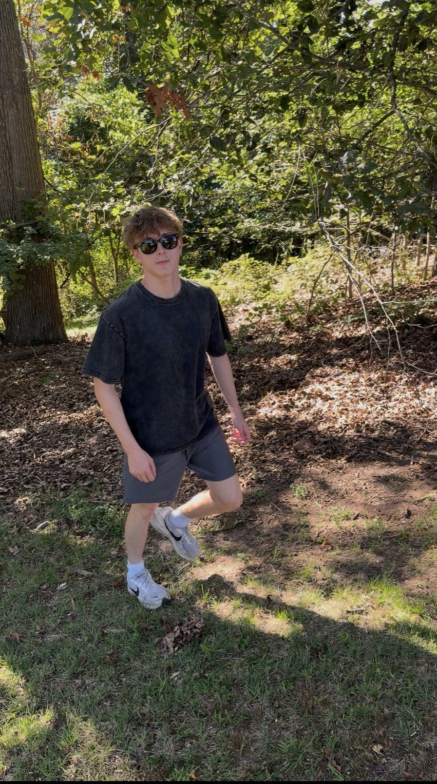 BeyondCure golf campaign walking portrait in the woods