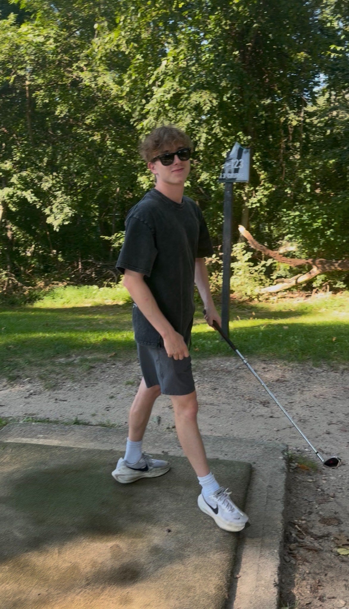 BeyondCure golf campaign walking portrait with club